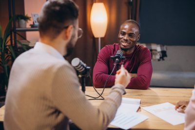 Podcasters recording dialogue